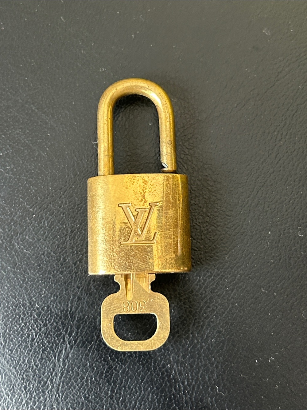 Louis Vuitton Gold-tone LV Padlock Key Holder